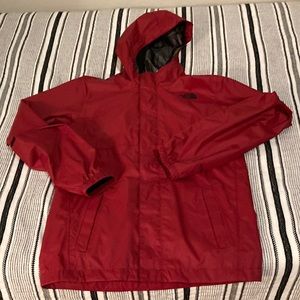 Red rain coat with pockets. North face in amazing condition.